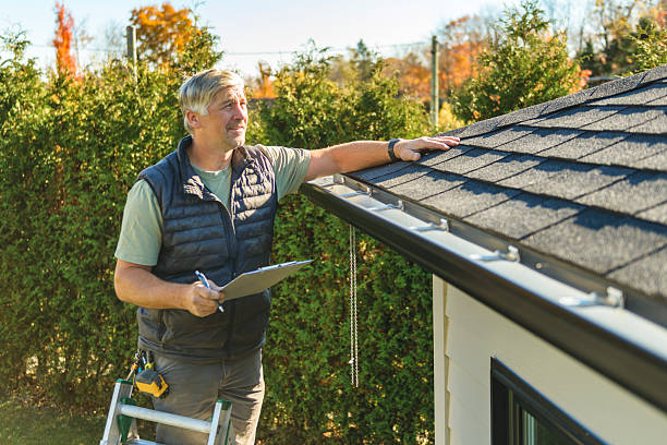Professional Roof Replacement technician working in Sweeden, KY